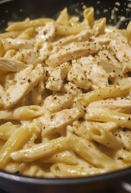 Creamy White Cheddar Garlic Cajun Chicken Pasta 1